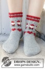 234-65 Santa Times Socks by DROPS Design thumbnail