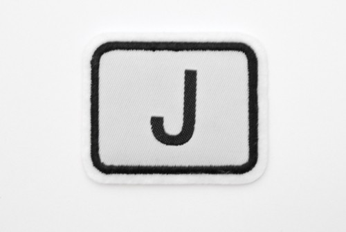 J